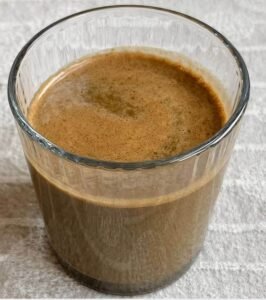 Spinach cocoa and almond milk smoothie