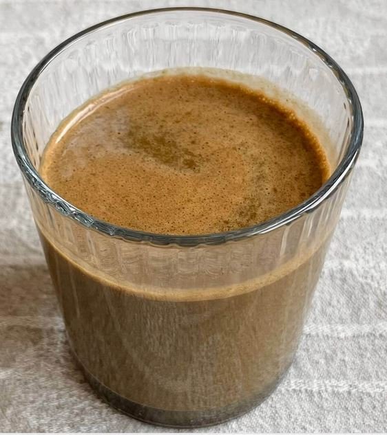 Spinach cocoa and almond milk smoothie